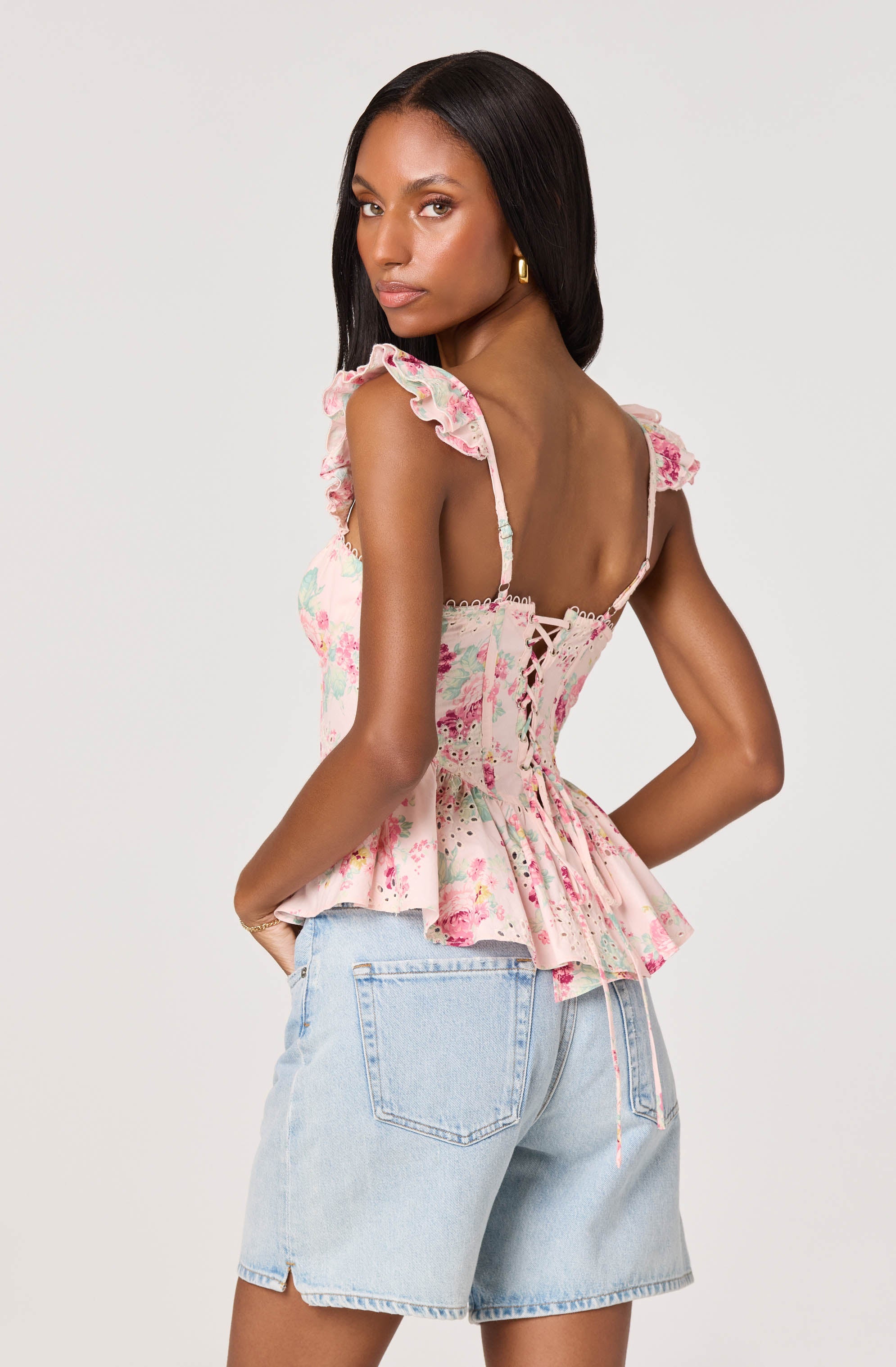 Baylin Eyelet Corset Peplum Top